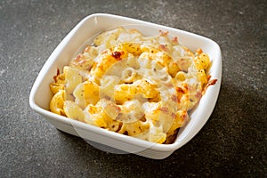 American mac and cheese, macaroni pasta in cheesy sauce