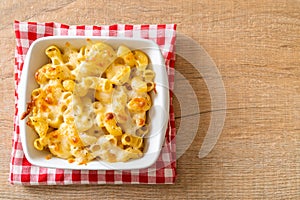 American mac and cheese, macaroni pasta in cheesy sauce