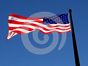 American morning flag in early dawn at Chicago navy pier