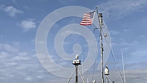 American navy flag ship blue sky