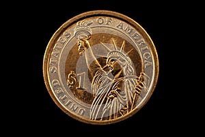 American One Dollar Coin Isolated On A Black Background