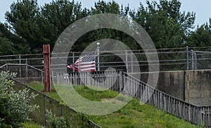 American patriotism .. american flag on dam,  Buffumville Dam