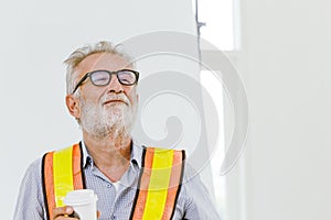 American professional worker senior engineer pleased for good work job done and ready for retirement concept