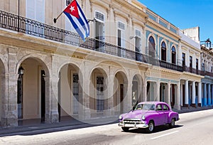 American purple 1951 vintage car on the street Paseo de Marti in Havana City Cuba - Serie Cuba