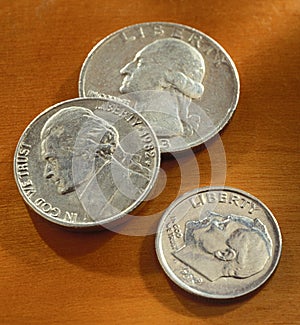 American quarter, nickel, and dime