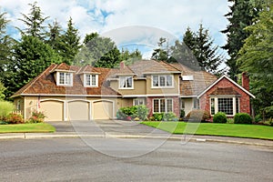 American real estate. Luxury house exterior with brick trim