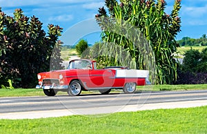 American red 1955 convertible classic car on the street in Varadero Cuba - Serie Cuba Reportage