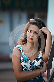 American redhead girl in suglasses. Photo in 60s style.