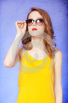American redhead girl in sunglasses