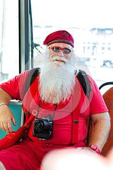 American Santa Claus in red summer suit