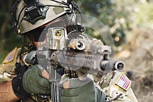 American soldier pointing his rifle