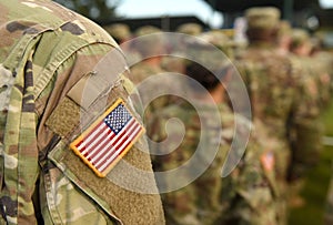 American Soldiers and Flag of USA on soldiers arm. US Army. Veteran Day photo