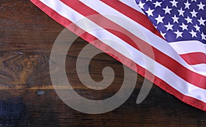 American Stars and Stripes Flag on Rustic Wood Background
