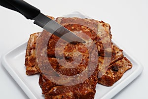 American style spare ribs with carving knife