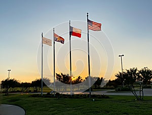 American and Texas flags in DFW Founders` Plaza photo