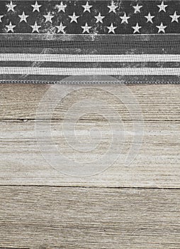 American thin gray line flag over weathered wood background