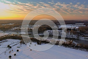 American town home complex near small river the residential streets after snowfall in snowy winter landscape