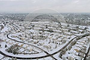 American town small home complex of a snowy winter on the residential streets after snowfall