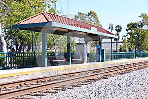 American train station with train tracks.