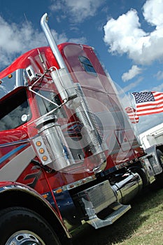 American truck with stars and stripes flag