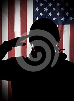 American (USA) soldier saluting to USA flag