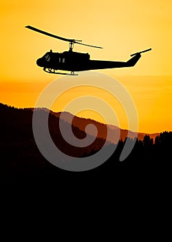 American utility military helicopter in the flight