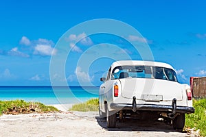 American white classic car parked on the beach in Varadero Cuba - Serie Cuba Reportage