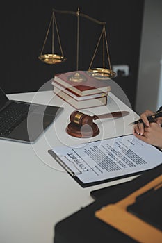 American woman lawyer or businesswoman African working with laptop, searching, analyzing data, reading contract documents work