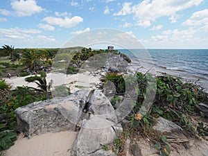 Amesome vantage point at seaside landscape at TULUM city in Mexico near archaeological site with tourists