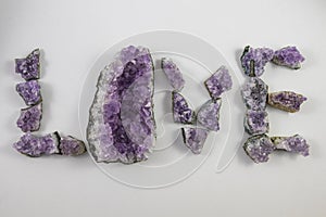 Amethyst chunks spelling Love