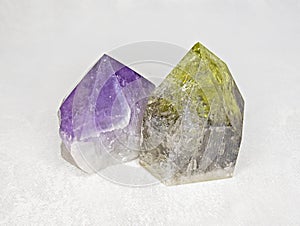Amethyst and citrine points on white background photo