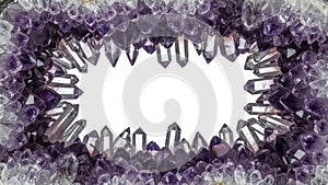Amethyst Crystal Frame on White Background with Copy Space