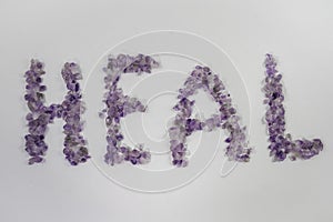 Amethyst Crystals Spelling the word Heal