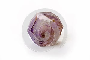 Amethyst dodecahedron isolated on a white background.