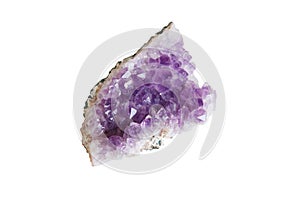 Amethyst druze crystal stone mineral. Purple rough quartz crystals geode isolated on white background