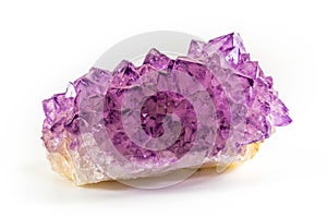 Amethyst stone druse cluster, isolated on white background. Natural, purple amethyst stone close-up. Amethyst stone is one of the
