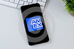 Amex app logo on a smartphone screen.