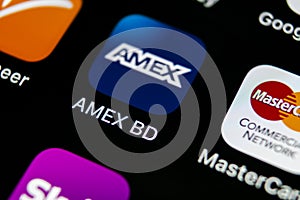 Amex application icon on Apple iPhone X smartphone screen close-up. Amex app icon. American express is an online electronic financ