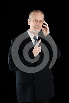 Amiable and Smiling Businessman on Phone