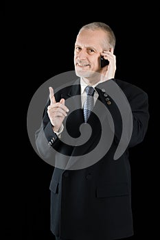 Amiable and Smiling Businessman on Phone