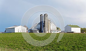 An Amish farm with corn silos near Strasburg, Pennsylvania, U.S