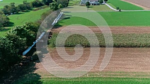 Amish Farmers Harvesting there Fall Crops as Seen by Drone