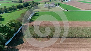 Amish Farmers Harvesting there Fall Crops as Seen by Drone