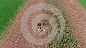 Amish Farmers Harvesting there Fall Crops as Seen by Drone