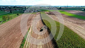 Amish Farmers Harvesting there Fall Crops as Seen by Drone