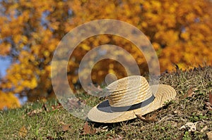 Amish Hat Laying Over Fall Leaves