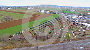 Amish Mud Sale as seen by Drone in Early Spring, Selling Buggies, Quilts and all types of Amish Goods