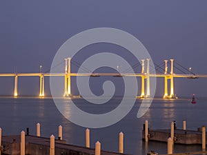 Amizade Bridge and port