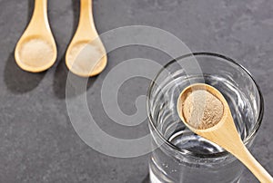 Amla powder and glass with water - Phyllanthus emblica