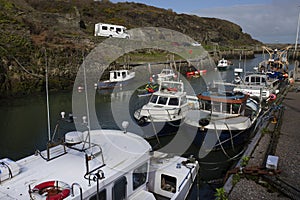 Amlwch Harbour with fishing boats moored. Amlwch Port, Anglesey, Wales, United Kingdom. 23rd March 202